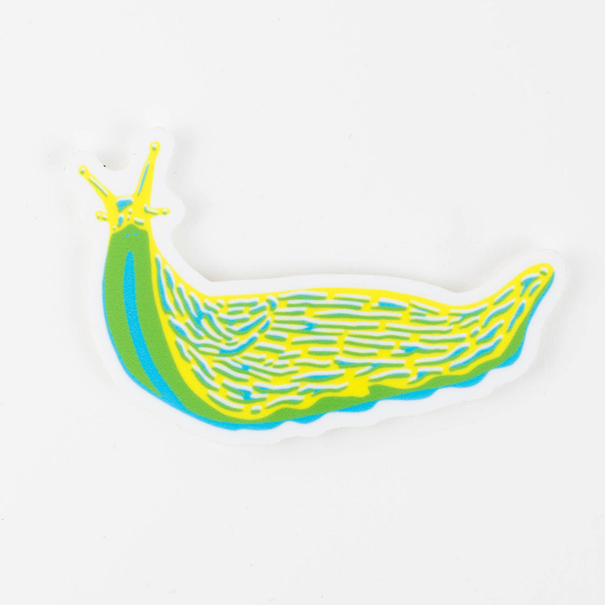 Colorful illustrated banana slug sticker, neon green and blue on white backing