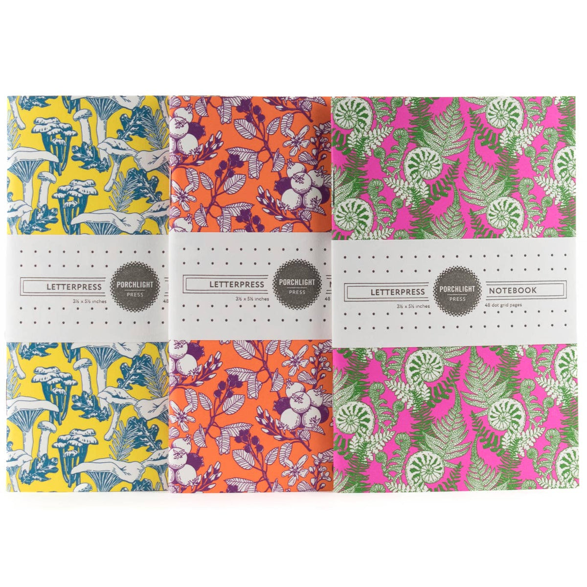 Set of 3 pocket notebooks with colorful illustrated forest foraging covers
