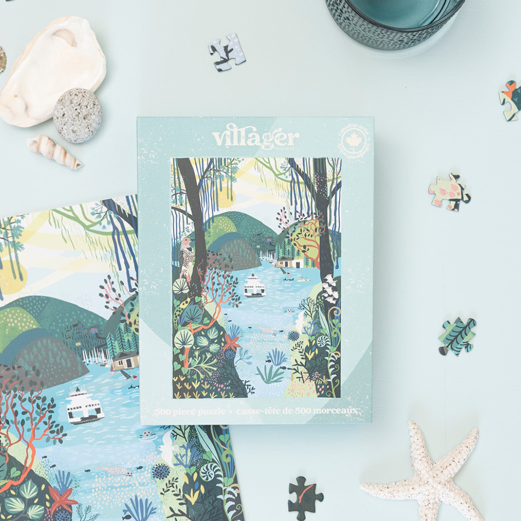 500-piece Villager puzzle box with scenic forest village artwork on light teal cover
