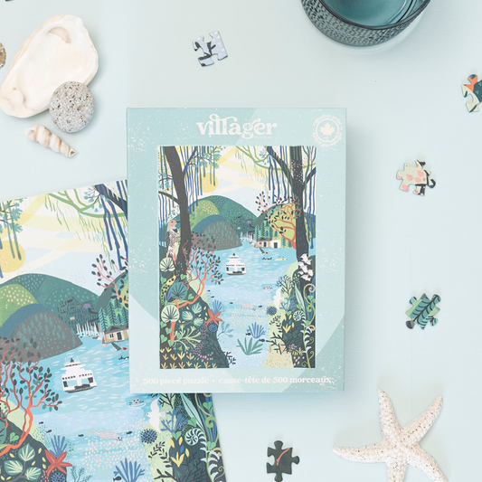 500-piece Villager puzzle box with scenic forest village artwork on light teal cover