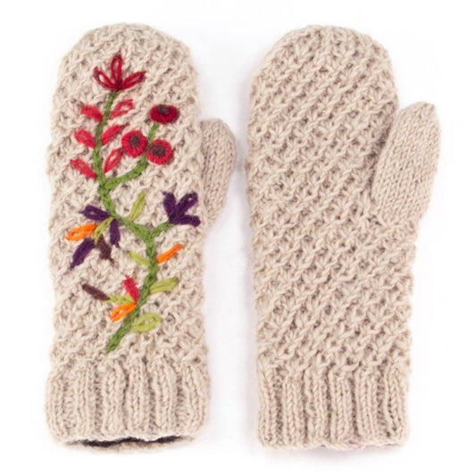 Light natural wool hand-knit mittens with colorful floral embroidery on the back.