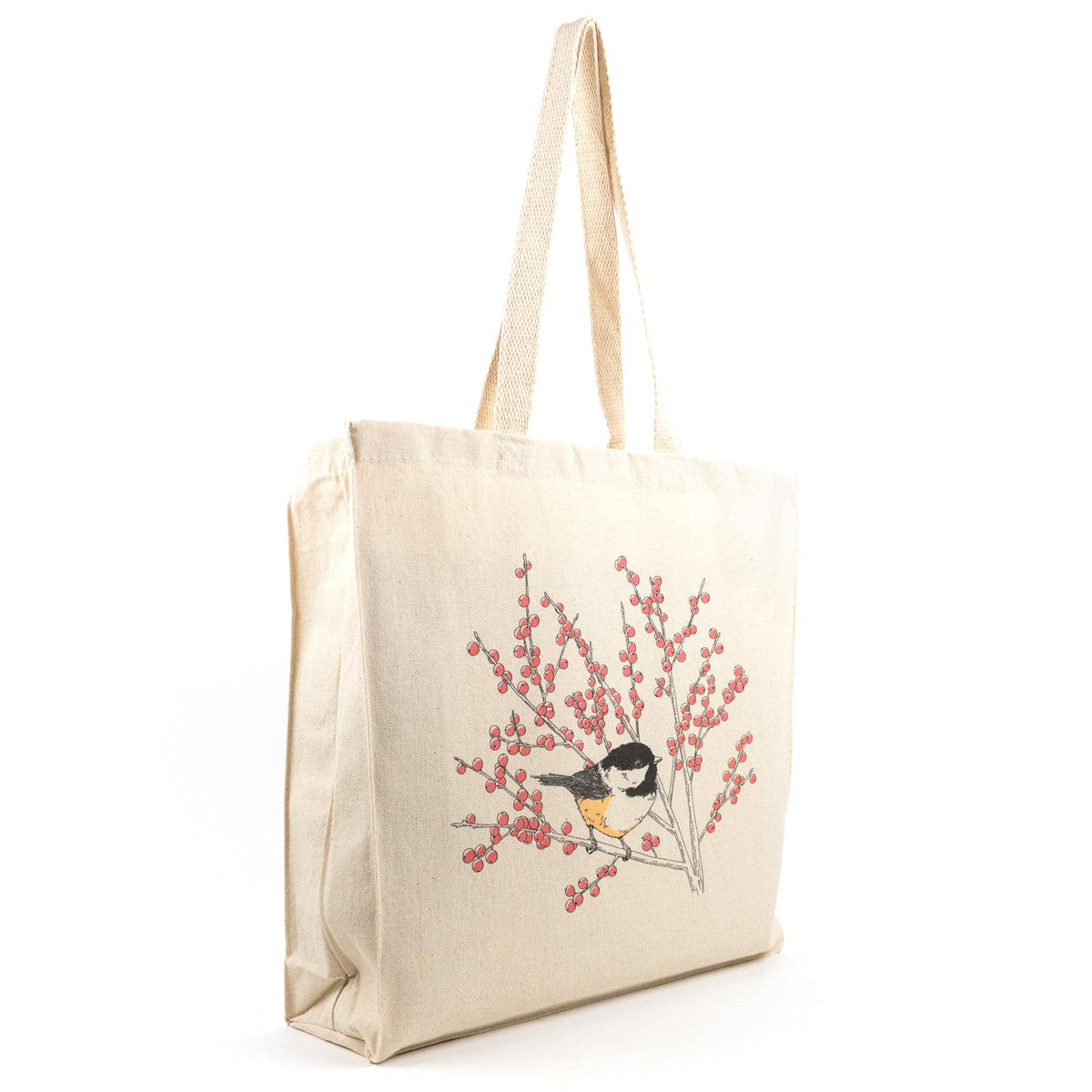 Cream canvas tote bag, angled view, with chickadee and red berry branch graphic